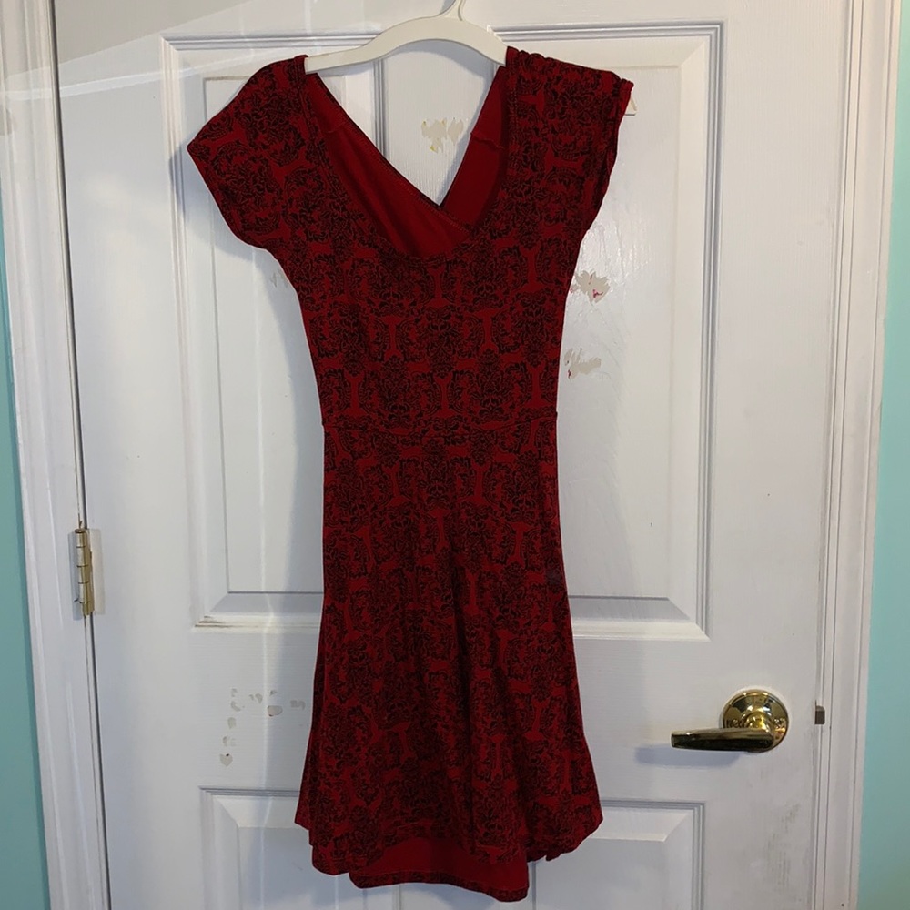 red and black patterned dress